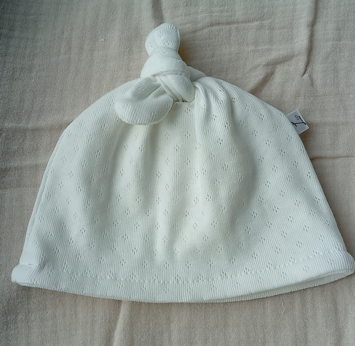 Mutsje wit pointelle 0-3M